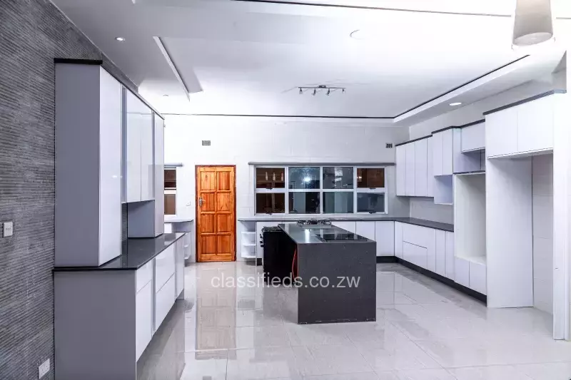 Complete kitchen with countertops and cupboards