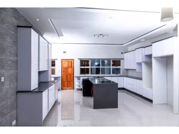 Complete kitchen with countertops and cupboards