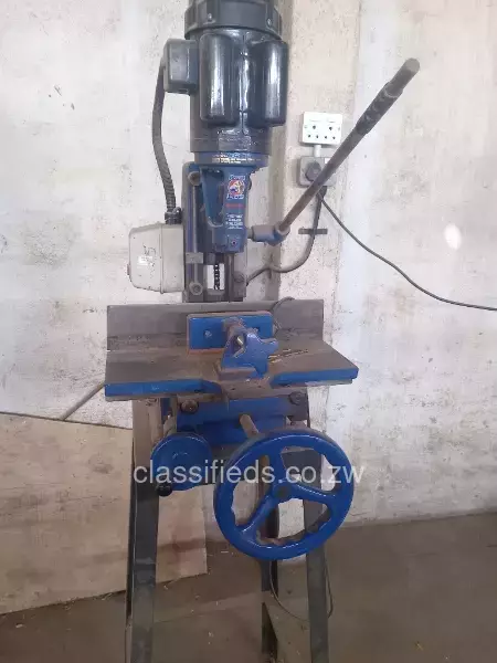 Freestanding hollow chisel mortiser