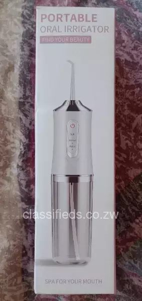 Oral Irrigator / Flosser. New. Rechargeable.