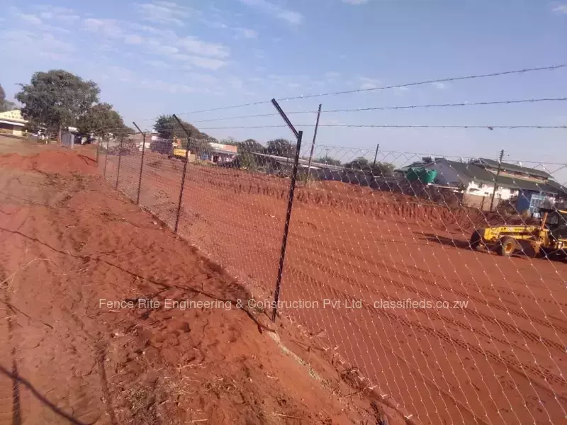 Diamond Mesh Fence With Barbed Wire On Top